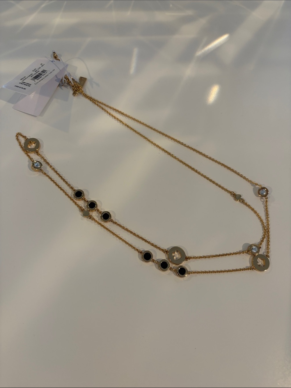 NWT Kate Spade long goldtone and black necklace